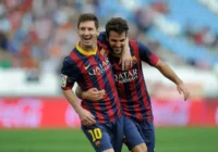 Lionel Messi y Cesc Fábregas (Photo by Denis Doyle/Getty Images)